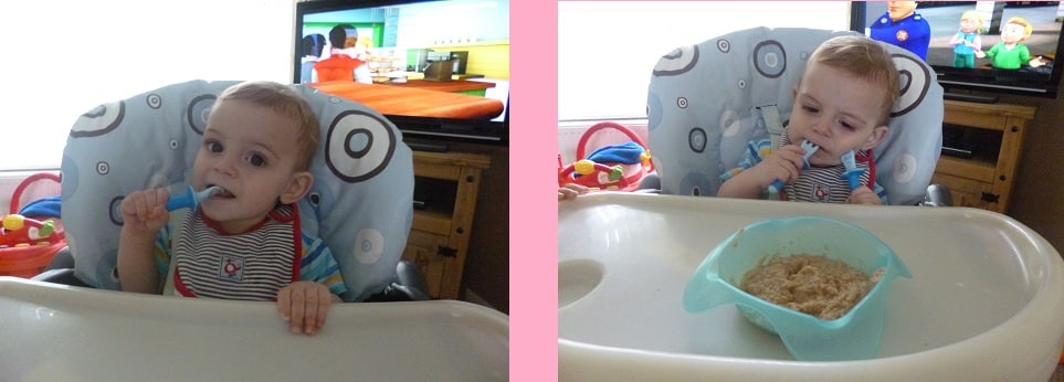 Two side-by-side photos of a baby in a highchair with a blue bowl of food, happily holding and chewing on a MAM Dipper Set spoon, with a colourful cartoon playing on TV in the background.