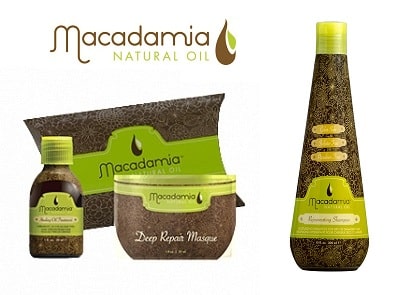 Four Macadamia Natural Oil haircare products, infused with nourishing Macadamia Oil, including a bottle, a "Deep Repair Masque" tub, a pouch, and a tall "Rejuvenating Shampoo," all in brown and green packaging.