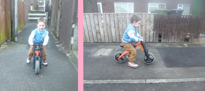 A young boy in a blue jacket and brown trousers rides an orange YBike Extreme balance bike outside on a paved path, shown from the front and side in two separate photos.