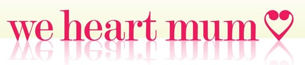 Text in pink reads "we heart mum" with a heart symbol at the end, mirrored below on a white background with a light gradient—the perfect tribute for every moment of work, play, and rest.