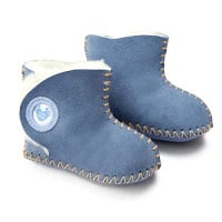 A pair of blue baby bootees made of soft material with light stitching along the edges and a round patch on the side, featuring a small heart design—perfect baby products for your little one.