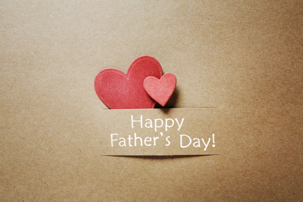 A brown card with two red hearts above the text “Happy Father’s Day!” in white letters. The simple, kraft paper-style background makes it a perfect choice for thoughtful Father’s Day gifts under ten pounds.