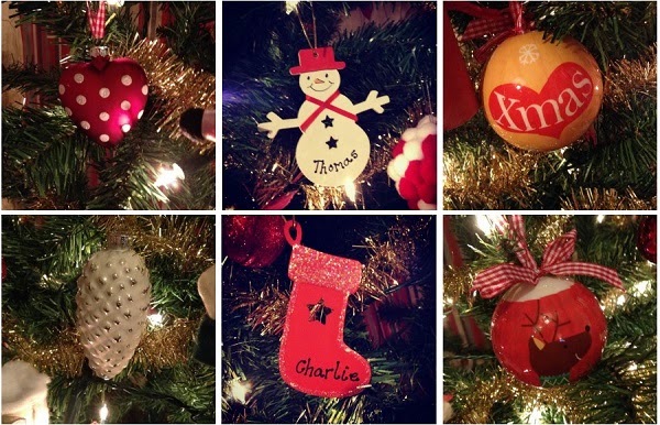 Six Christmas tree baubles perfect for Christmas family time: a red heart with white polka dots, a snowman labelled "Thomas," a red-and-yellow bauble with "Xmas," a white pine cone, a red stocking labelled "Charlie," and a reindeer bauble.
