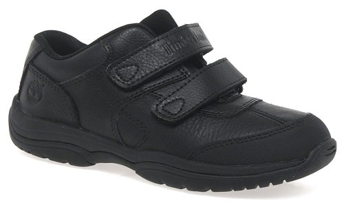 A black leather trainer with two Velcro straps, textured detailing, and a thick rubber sole—perfect back to school shoes for casual or everyday wear.