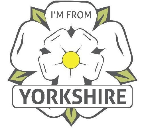 A white Yorkshire rose with green leaves surrounds the text “I’M FROM YORKSHIRE,” with 'YORKSHIRE' in bold letters below the centre of the rose.