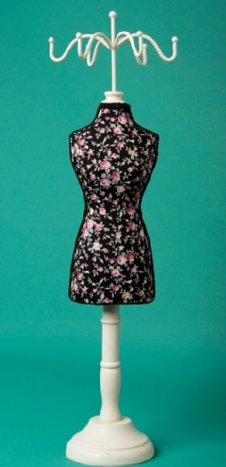 A black floral dress form mannequin with a white stand and decorative hooks on top, set against a turquoise background—an elegant piece perfect for Christmas Gifts or as chic inspiration in your Gift Ideas for Women.