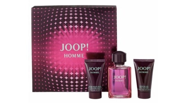A Joop! Homme gift set including a pink and black box, a perfume bottle with pink liquid, and two matching tubes, all featuring the Joop! Homme branding—perfect for Gifts for Men or as a highlight in your Christmas Gift Guide.