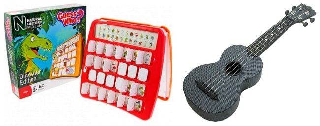 A Guess Who? board game, Natural History Museum Dinosaur Edition, with a red game board and box on the left, and a black ukulele on the right—great Christmas Gift Guide inspiration for Older Boys, set against a white background.