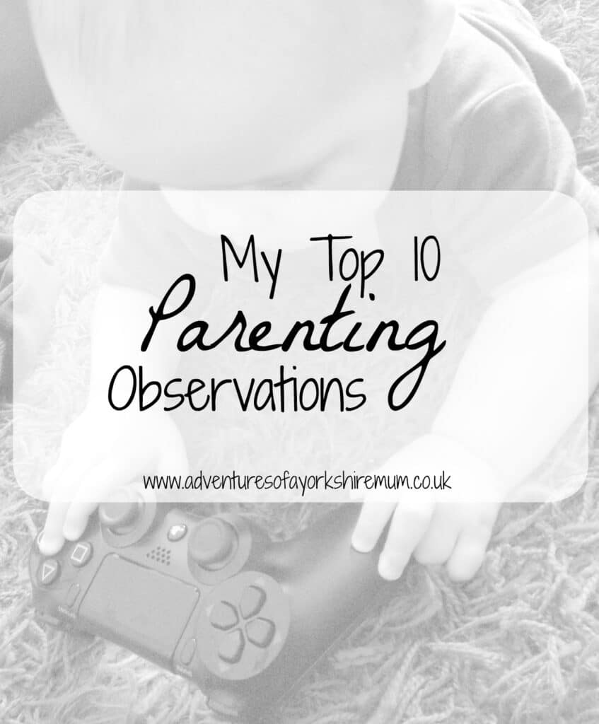 A baby lying on a soft surface holding a video game controller. Overlaid text reads: "My Top 10 Parenting Observations & Tips. www.adventuresofyorkshiremum.co.uk".