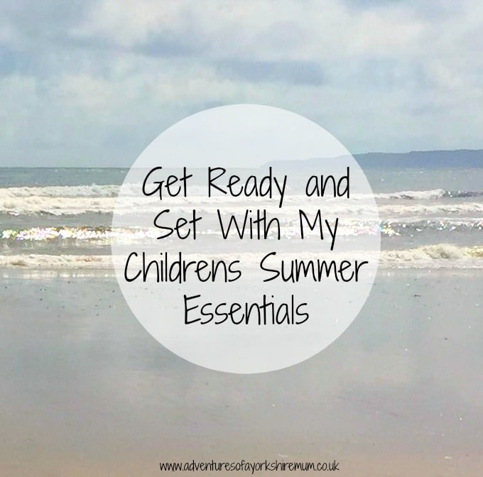 Text reads “Get Ready and Set With My Children’s Summer Essentials” over a beach scene with gentle waves, wet sand, and a cloudy sky—perfect inspiration for summer essentials for children. Website "adventuresofayorkshiremum.co.uk" appears at the bottom.