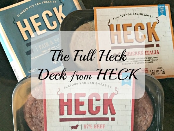 A selection of HECK food products, including sausage and burger packs, displayed on a surface. Overlay text reads: "The Full Heck Deck from HECK," showcasing the delicious variety in the Heck Deck collection.