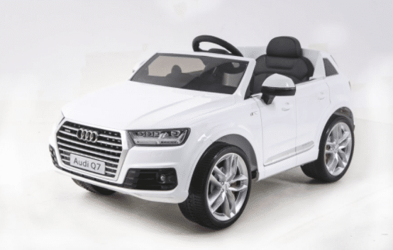 A white toy electric car designed to resemble an Audi Q7, shown from a front angle against a plain white background. Perfect for children who love ride-on bikes, it features realistic details like headlamps and wheels.
