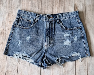 demim shorts on a wooden floor