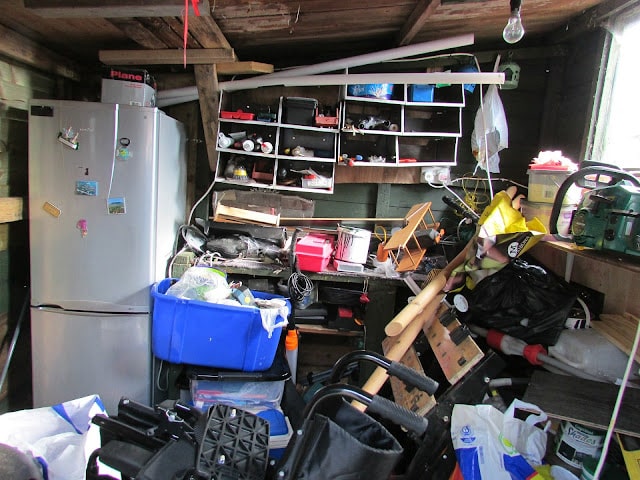 a very cluttered and messy room in the house