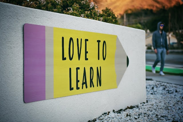 Love to Learn sign in the shape of a pencil