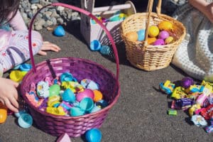 A number of colourful easter baskets sat on the ground