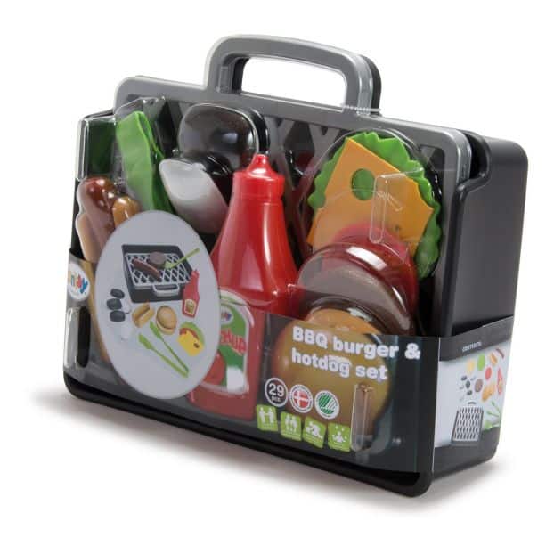 A plastic carrying case containing a Dantoy barbecue playset with toy BBQ burger and hot dog, including play food items like buns, ketchup bottle, lettuce, burger patty, hot dog, and accessories. The clear packaging displays everything inside.
