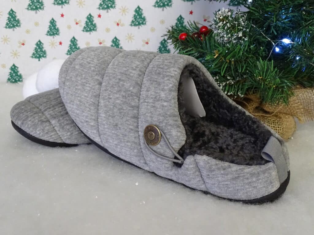 A pair of grey slippers