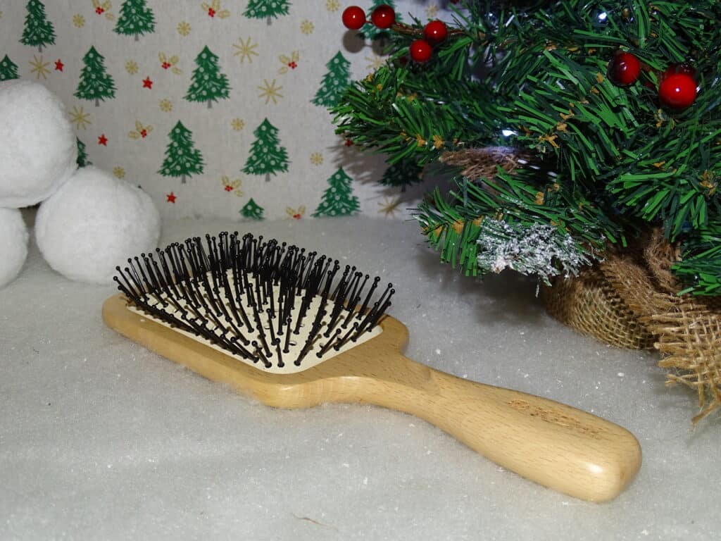 A paddle hair brush