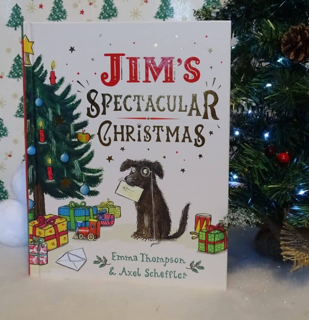 The cover of "Jim's Spectacular Christmas" features a black dog with a letter, surrounded by presents and a tree—perfect for Christmas Gift Ideas for Children 2022. Authors Emma Thompson & Axel Scheffler are listed at the bottom.