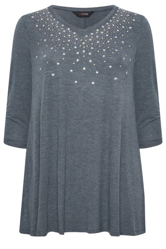 A grey, long-sleeved tunic with a V-neckline, featuring a scattered pattern of white and silver stars around the top front—makes a perfect Mother’s Day outfit.