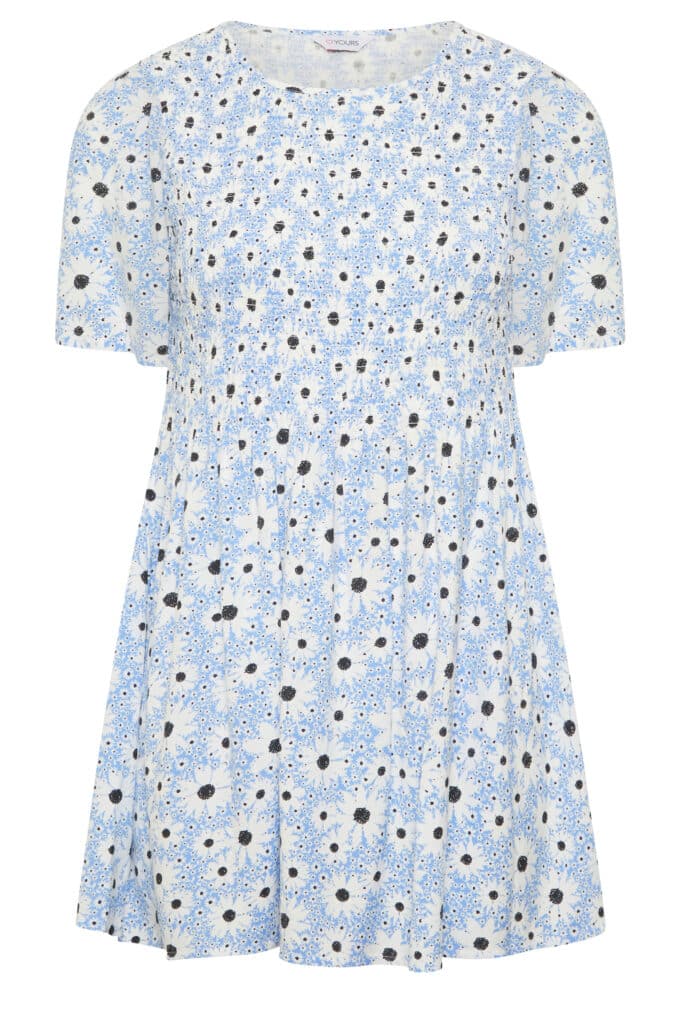 A short-sleeved, loose-fitting dress with a light blue and white floral pattern featuring black centres. With its round neckline and gathered waist, it offers a relaxed, flowy fit—making it the perfect Mother’s Day outfit.