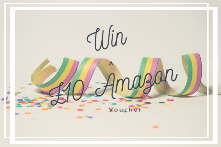 Colourful party streamers and confetti surround the elegant script text overlay: "Win A £10 Amazon Voucher," all beautifully framed by crisp white borders.