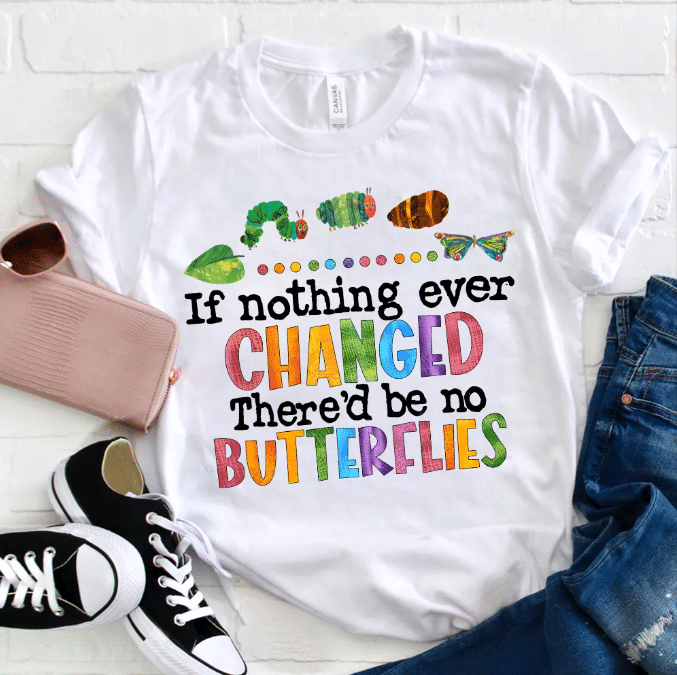 A white T-shirt with colourful illustrations of a caterpillar, cocoon, and butterfly, plus playful text—perfect for Y2K Kids Turned Teachers: How to Rock a Fashionable Classroom when paired with jeans and trainers.