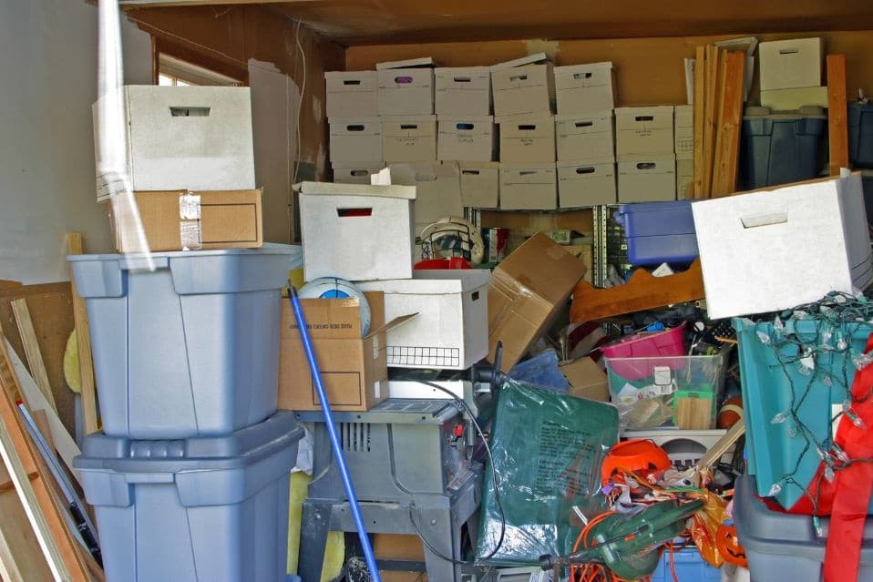 Lots of boxes of clutter in a room or garage