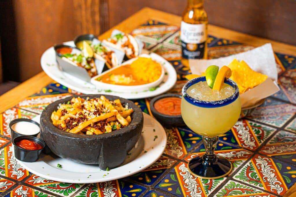 An array of Mexican food set out on a table