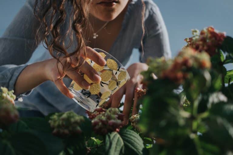 A woman watering her plants