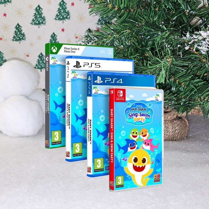 Four cases of "Baby Shark: Sing & Swim Party" for Xbox, PS5, PS4, and Nintendo Switch stand in front of a decorated Christmas tree and snowballs, creating a festive, wintry Christmas scene.