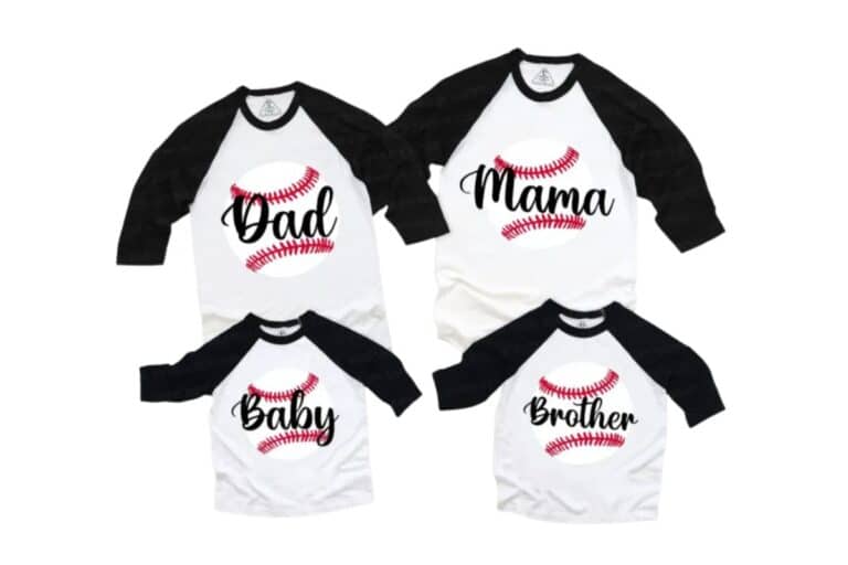 Four white and black raglan family shirts are arranged together, each featuring a red baseball graphic and text: "Dad," "Mum," "Baby," and "Brother." The shirts are laid out on a white background.